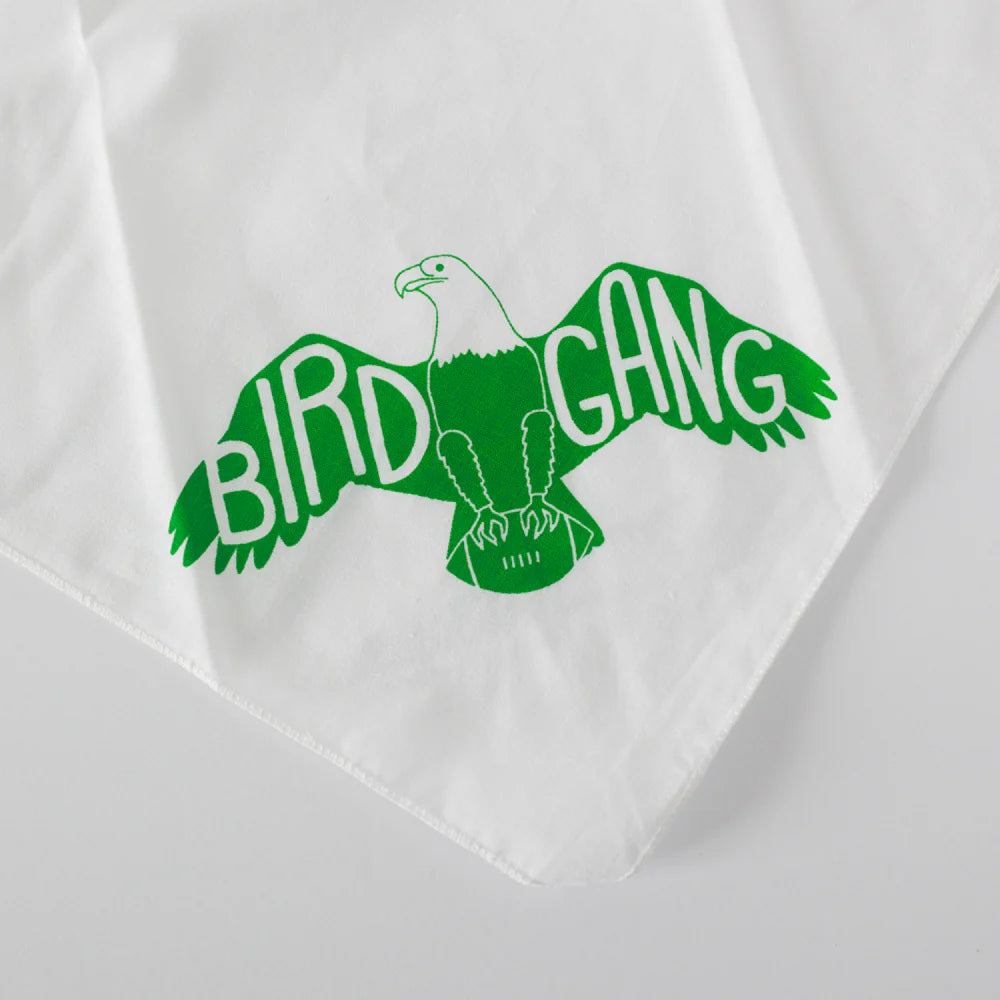 Green 'BIRD GANG' design on a white shirt