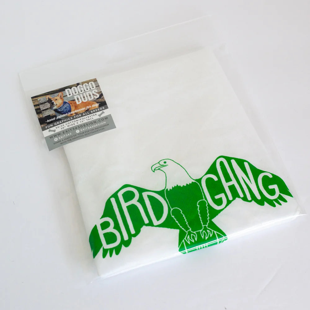 White towel with green 'BIRD GANG' design and 'Poggo Duds' card on a white background