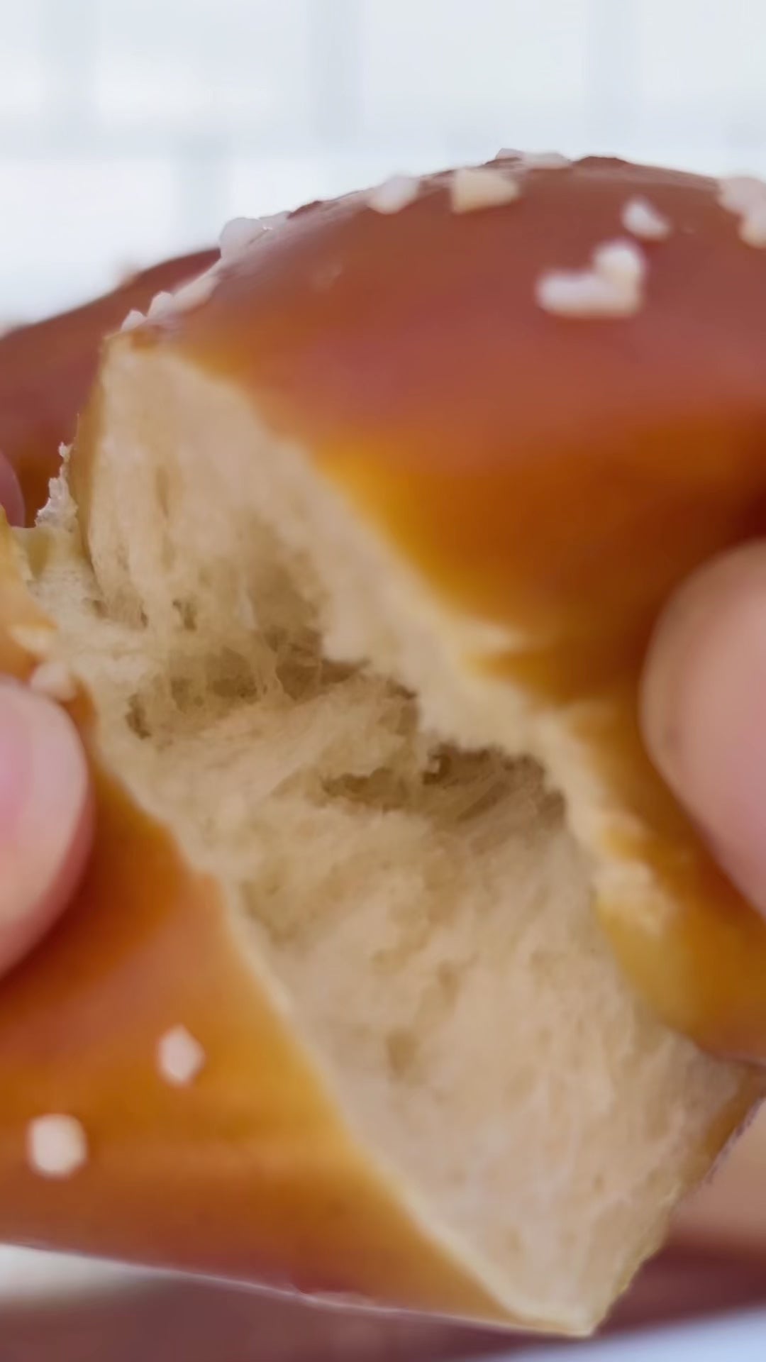 Video of chewy pretzel being torn apart